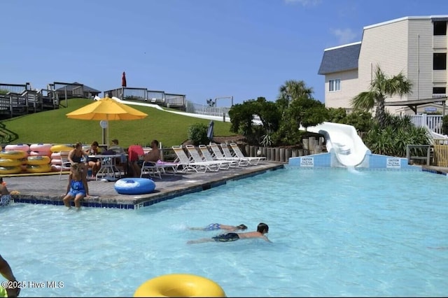 1904 E Fort Macon Rd Unit 269, Atlantic Beach, NC 28512 - community pool featuring a lawn