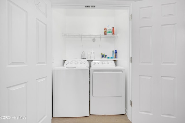 409 Womble St, Oak Island, NC 28465 - laundry room with independent washer and dryer