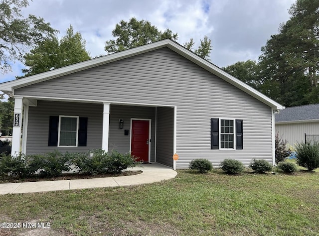 622 Williams St, Enfield, NC 27823 - view of front of home with a front yard and covered porch