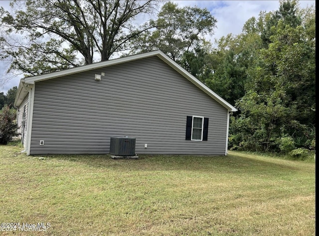 622 Williams St, Enfield, NC 27823 - view of side of home with cooling unit and a lawn