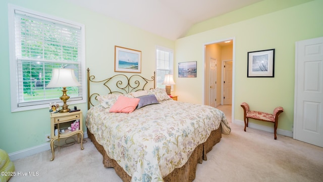 777 Marsh Rose Path NW, Calabash, NC 28467 - bedroom with light carpet, vaulted ceiling, and baseboards