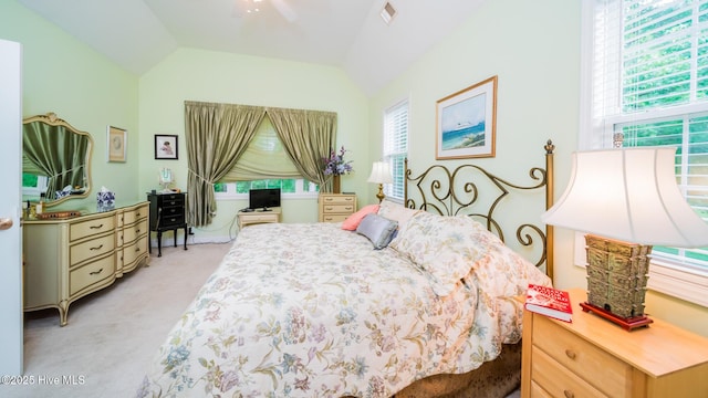 777 Marsh Rose Path NW, Calabash, NC 28467 - bedroom with light carpet, multiple windows, lofted ceiling, and a ceiling fan
