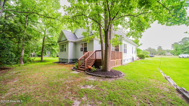 777 Marsh Rose Path NW, Calabash, NC 28467 - back of house featuring crawl space, a yard, a deck, and roof with shingles