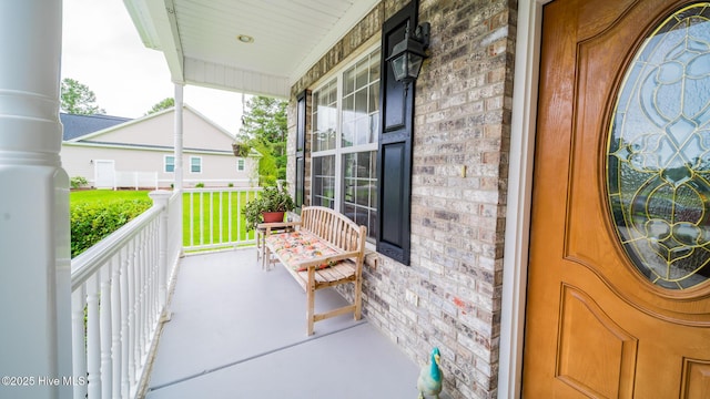 777 Marsh Rose Path NW, Calabash, NC 28467 - entrance to property with covered porch and brick siding