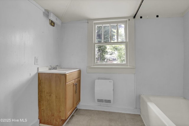 222 Evans St, Wilmington, NC 28405 - bathroom with a tub, vanity, and heating unit