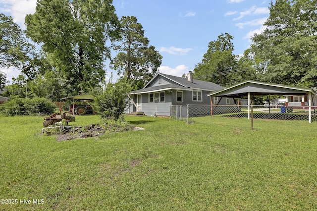 222 Evans St, Wilmington, NC 28405 - view of yard featuring a carport