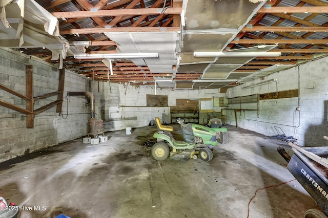 222 Evans St, Wilmington, NC 28405 - garage featuring concrete block wall