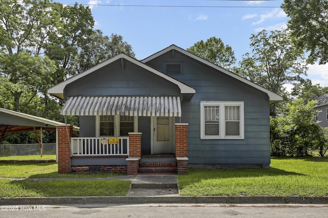 222 Evans St, Wilmington, NC 28405 - bungalow-style house featuring a porch