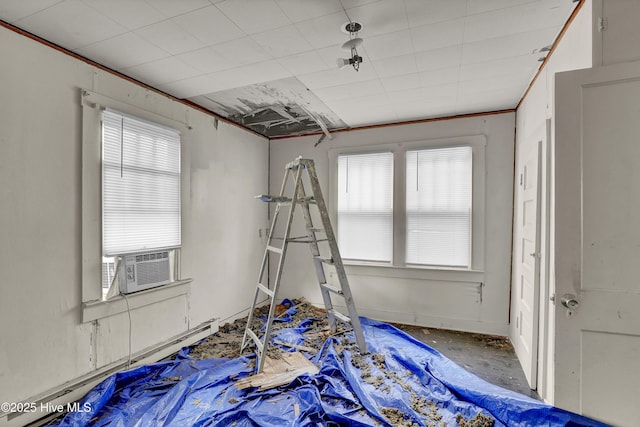 222 Evans St, Wilmington, NC 28405 - playroom featuring plenty of natural light, baseboard heating, and cooling unit