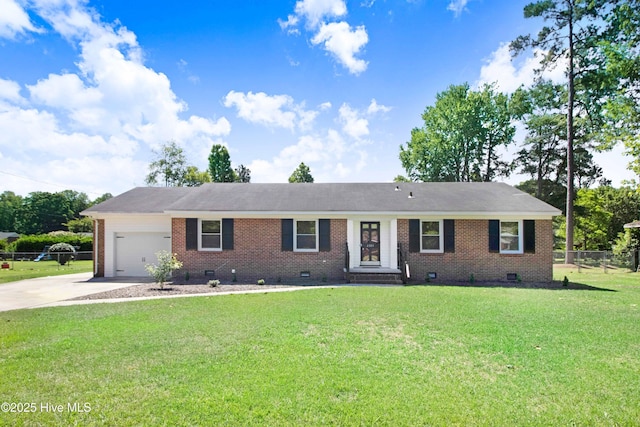 2305 Hardee Rd, Kinston, NC 28504 - ranch-style house with crawl space, concrete driveway, an attached garage, and brick siding