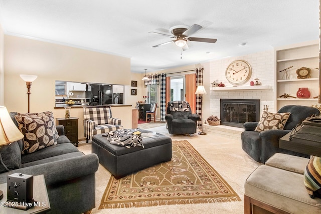 2305 Hardee Rd, Kinston, NC 28504 - carpeted living room featuring a ceiling fan and a brick fireplace