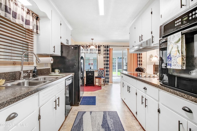 2305 Hardee Rd, Kinston, NC 28504 - kitchen featuring black appliances, white cabinetry, dark countertops, and light floors