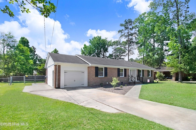 2305 Hardee Rd, Kinston, NC 28504 - single story home featuring a garage, brick siding, and driveway