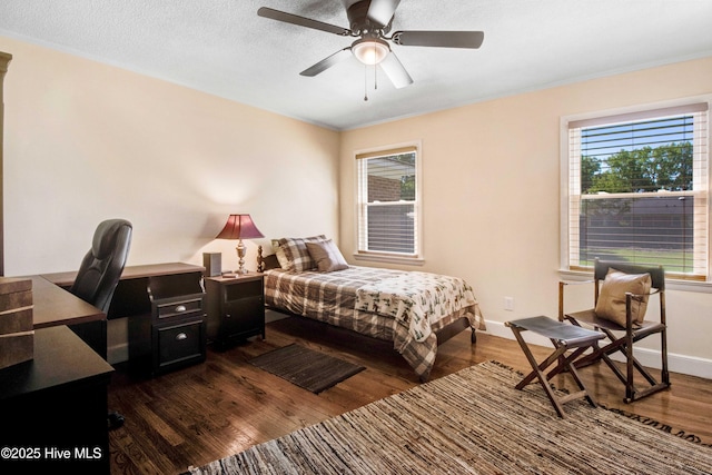 2305 Hardee Rd, Kinston, NC 28504 - bedroom with wood finished floors, a desk, crown molding, and a ceiling fan