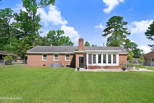 2305 Hardee Rd, Kinston, NC 28504 - rear view of property featuring brick siding, a patio area, a chimney, entry steps, and a gate