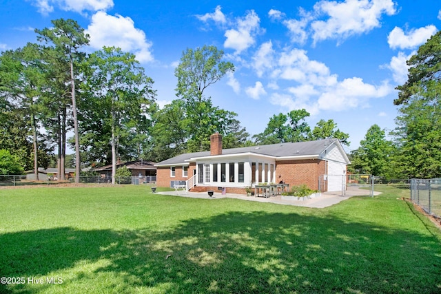 2305 Hardee Rd, Kinston, NC 28504 - back of property with brick siding, a chimney, a patio, entry steps, and a fenced backyard