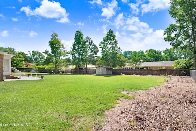 2305 Hardee Rd, Kinston, NC 28504 - fenced backyard with a patio area and a shed