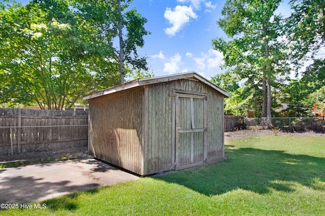 2305 Hardee Rd, Kinston, NC 28504 - view of shed with a fenced backyard