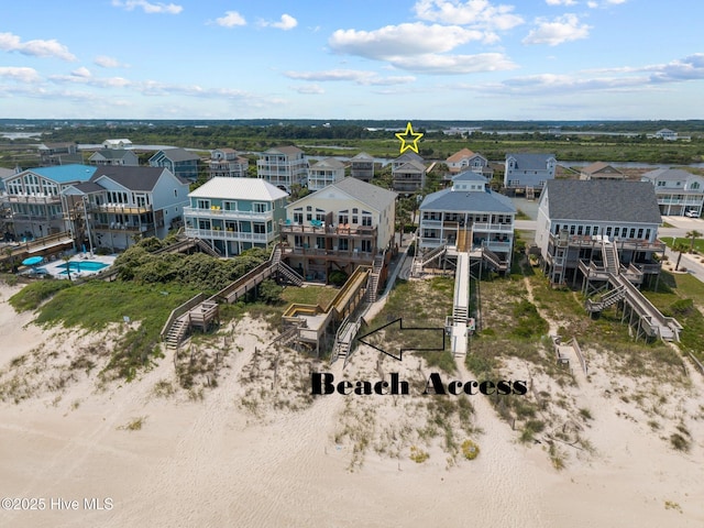 3725 Island Dr, North Topsail Beach, NC 28460 - aerial perspective of suburban area featuring a pool area