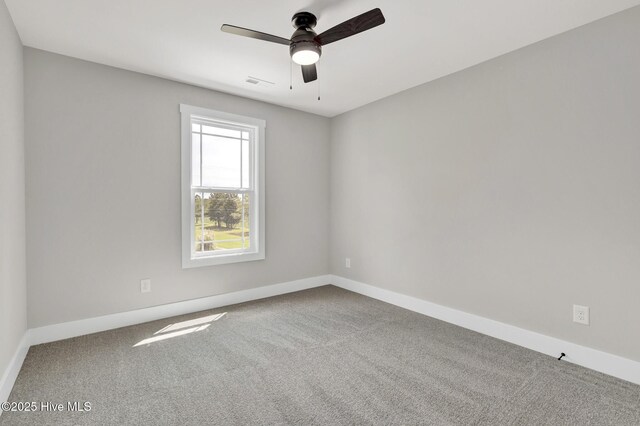 4037 Fulford Mcmillan Rd, Raeford, NC 28376 - spare room featuring carpet, ceiling fan, and baseboards