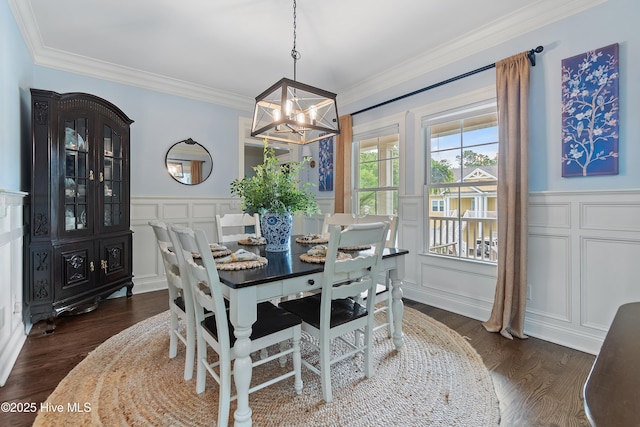 1086 Ferry Landing Dr SW, Supply, NC 28462 - dining area with a decorative wall, a chandelier, crown molding, wainscoting, and dark wood finished floors