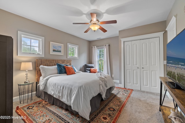 1086 Ferry Landing Dr SW, Supply, NC 28462 - carpeted bedroom featuring a closet, baseboards, and ceiling fan