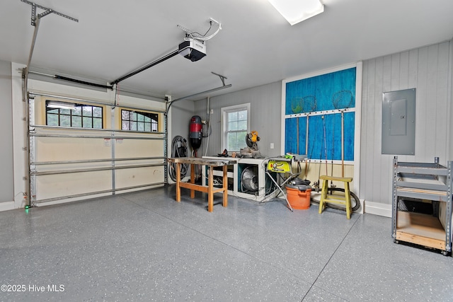 1086 Ferry Landing Dr SW, Supply, NC 28462 - garage with electric panel, a garage door opener, and a central vacuum unit