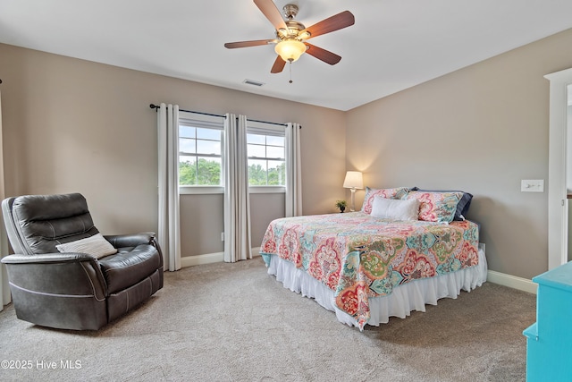 1086 Ferry Landing Dr SW, Supply, NC 28462 - carpeted bedroom featuring baseboards and a ceiling fan