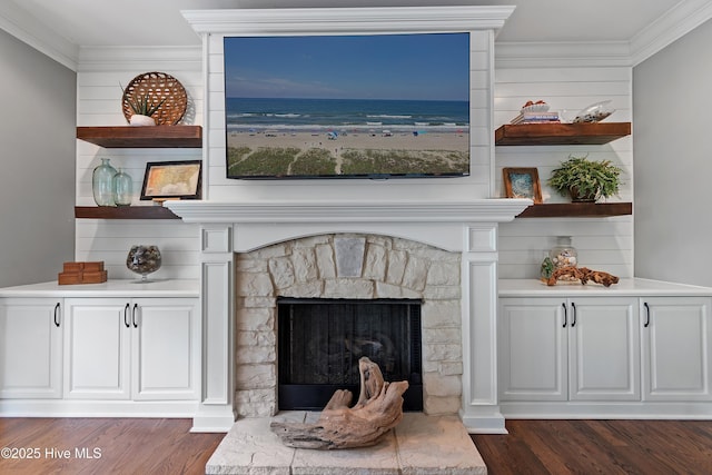 1086 Ferry Landing Dr SW, Supply, NC 28462 - detailed view of ornamental molding, wood finished floors, and a stone fireplace