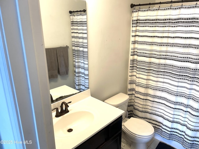 219 Grove Ln, Havelock, NC 28532 - bathroom featuring toilet, vanity, and a shower with shower curtain