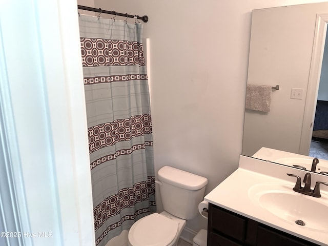 219 Grove Ln, Havelock, NC 28532 - bathroom featuring toilet, vanity, and a shower with curtain