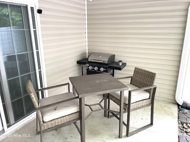 219 Grove Ln, Havelock, NC 28532 - view of patio / terrace featuring a grill and outdoor dining space