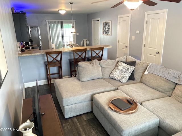 219 Grove Ln, Havelock, NC 28532 - living room with dark wood finished floors and ceiling fan