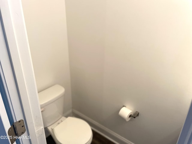 219 Grove Ln, Havelock, NC 28532 - bathroom featuring toilet and baseboards