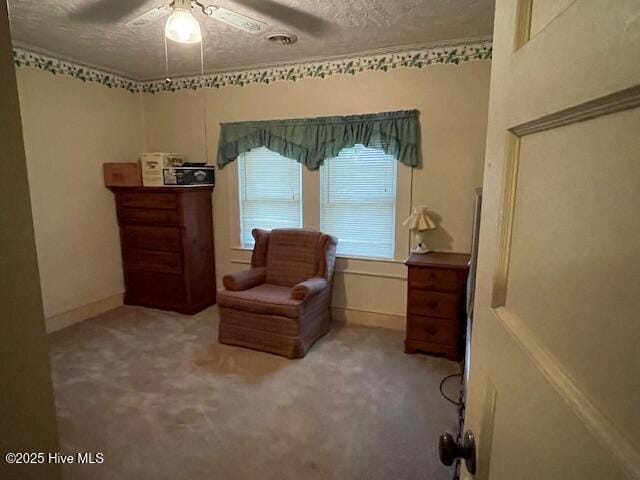 302 Lower St, Elizabethtown, NC 28337 - living area with carpet floors, ceiling fan, a textured ceiling, and baseboards