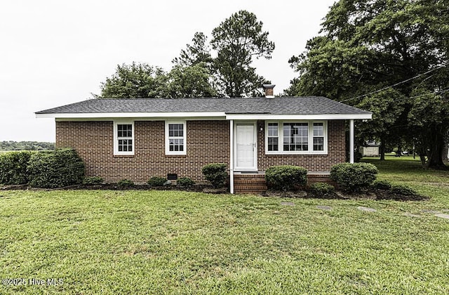 8774 Red Oak Battleboro Rd, Battleboro, NC 27809 - single story home with brick siding, a front lawn, and a chimney