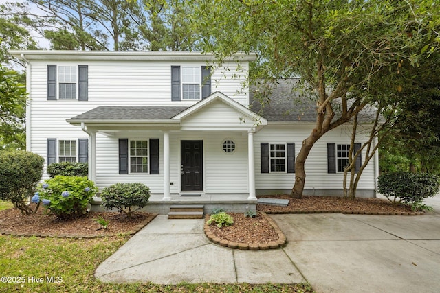 123 S Park Ln, Newport, NC 28570 - view of front facade featuring covered porch and roof with shingles