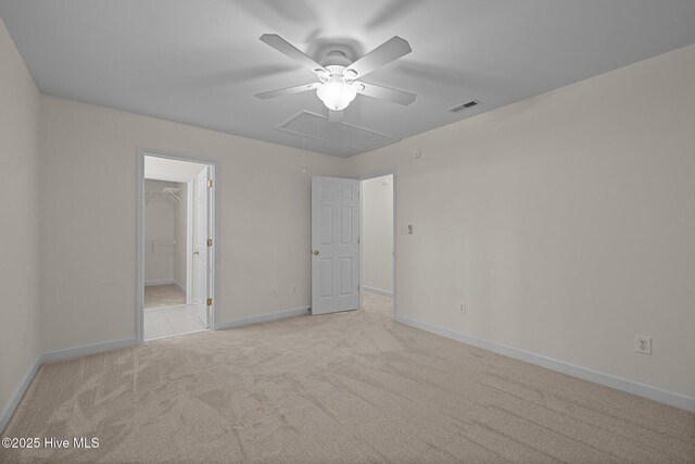 123 S Park Ln, Newport, NC 28570 - unfurnished bedroom featuring attic access, light colored carpet, baseboards, and a ceiling fan