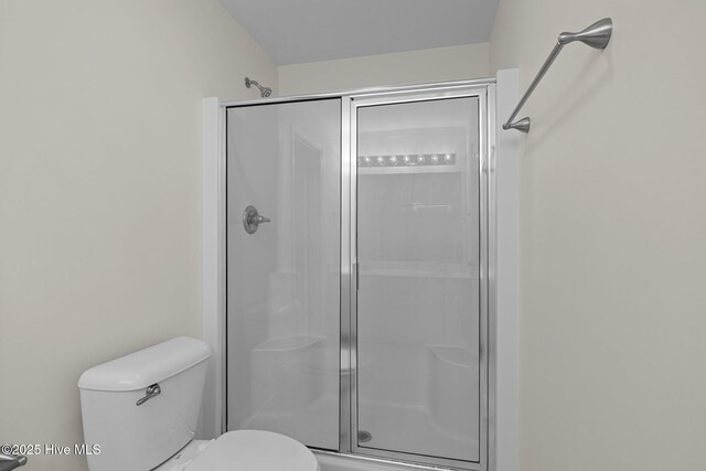 123 S Park Ln, Newport, NC 28570 - bathroom with a shower stall and toilet