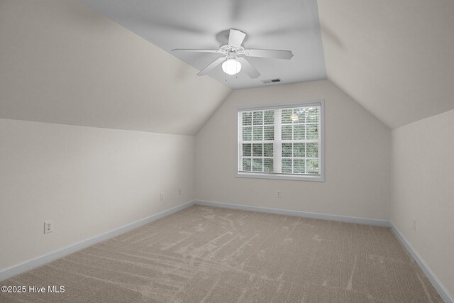 123 S Park Ln, Newport, NC 28570 - additional living space featuring carpet floors, lofted ceiling, a ceiling fan, and baseboards
