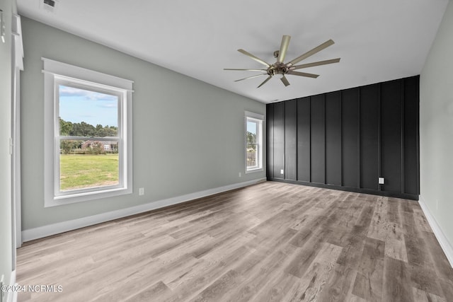 604 Willbrook Cir, Sneads Ferry, NC 28460 - empty room featuring light wood-style flooring, ceiling fan, and baseboards