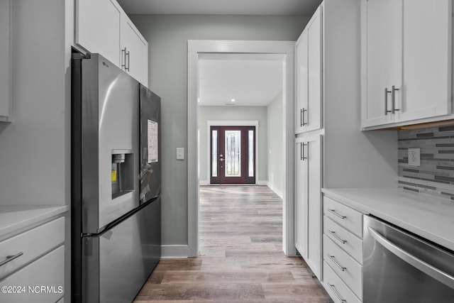604 Willbrook Cir, Sneads Ferry, NC 28460 - kitchen with appliances with stainless steel finishes, decorative backsplash, white cabinetry, light countertops, and recessed lighting