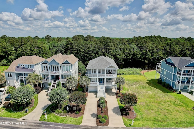 2820 Harborside Way, Southport, NC 28461 - aerial view of property and surrounding area with a heavily wooded area