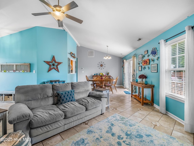 102 Sand Ct, Jacksonville, NC 28546 - living room with lofted ceiling, tile patterned floors, a chandelier, ceiling fan, and baseboards