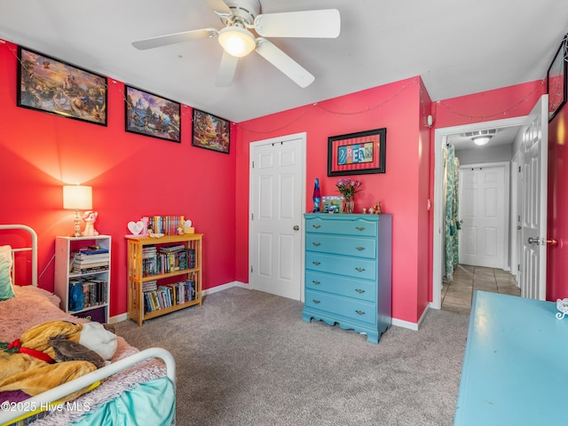 102 Sand Ct, Jacksonville, NC 28546 - carpeted bedroom with a ceiling fan and baseboards