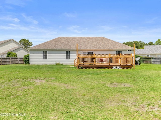 102 Sand Ct, Jacksonville, NC 28546 - rear view of house with a shingled roof and a wooden deck
