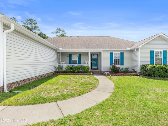 102 Sand Ct, Jacksonville, NC 28546 - single story home with covered porch, a front lawn, and a shingled roof