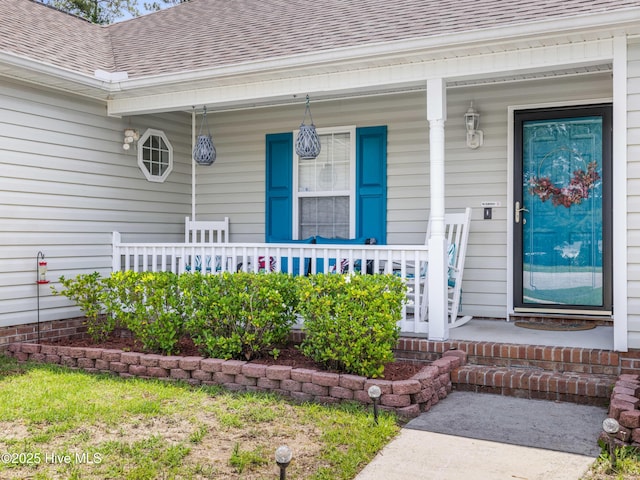 102 Sand Ct, Jacksonville, NC 28546 - entrance to property featuring a shingled roof and covered porch