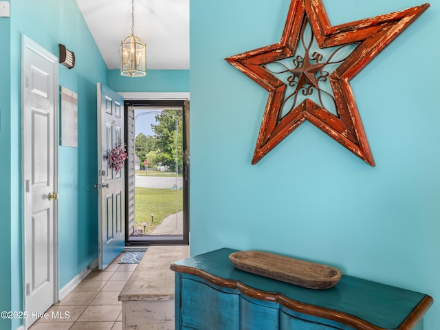 102 Sand Ct, Jacksonville, NC 28546 - foyer entrance featuring a chandelier, tile patterned flooring, and lofted ceiling