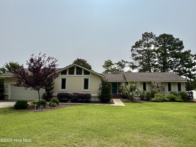 1608 Brices Creek Rd, New Bern, NC 28562 - view of front of home with concrete driveway, a garage, a front lawn, and stucco siding
